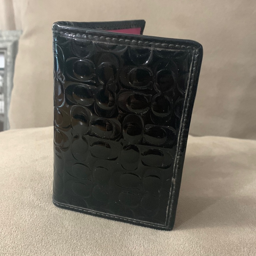 Coach wallet black pink lining